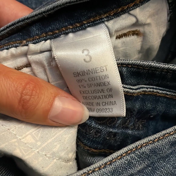 Distressed Skinnys - Picture 3 of 4